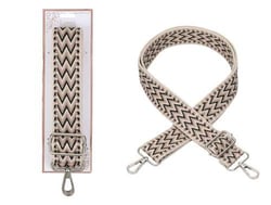 a purse strap with a chevron pattern and a metal hook on a white background .