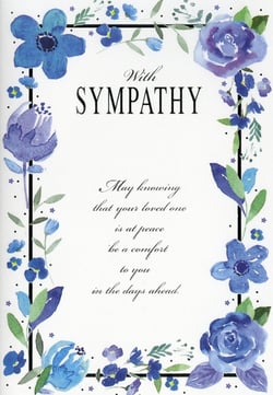 Offer a heartfelt message of support with this elegant Sympathy card from Simon Elvin. Featuring a beautiful watercolour design, delicate blue and purple flowers frame a comforting message, providing a gentle touch during difficult times. The thoughtful sentiment, 'May knowing that your loved one is at peace be a comfort to you in the days ahead,' offers solace and understanding. Perfect for retailers, these high-quality cards come in a convenient pack of 6, ensuring you're always stocked to help your customers convey their deepest condolences with grace and care.
