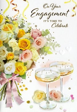 Help your customers celebrate one of life's most joyous milestones with this exquisite "On Your Engagement" card from Simon Elvin. Featuring a stunning bouquet of yellow, cream, and soft pink roses, beautifully tied with a delicate pink ribbon, this design radiates romance and celebration. Two elegant champagne coupes, surrounded by festive confetti, complete the celebratory scene. The heartfelt message "On Your Engagement, IT'S TIME TO Celebrate" is presented in elegant script. This high-quality card is perfect for retailers seeking a beautiful and memorable option for engaged couples. Available in a convenient pack of 6, ensuring you're always ready to meet demand.