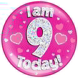 A pink plate with the words "I am 9 today" on it.