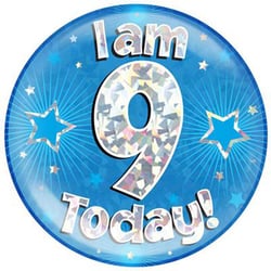 A blue balloon with the words "I am 9 today" on it.