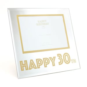 A picture frame that says "Happy 30th" on it.