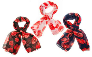 Introduce a touch of timeless elegance to your collection with our delightful Poppy Scarf 3 Asst. These beautiful scarves feature a vibrant poppy print, perfect for adding a pop of colour to any outfit.
Each wholesale pack contains three assorted designs, as pictured: a striking black background, a fresh white base, and a sophisticated navy option. Crafted from a lightweight fabric, they offer versatile styling for all seasons – ideal for a breezy summer evening or as a charming accessory during cooler months.
These eye-catching scarves are sure to be a popular choice with your customers, offering both style and comfort. With a convenient pack size of 1x3, they are ready to brighten up your retail display!