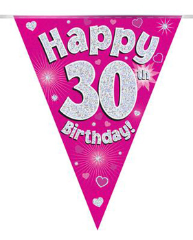 A pink banner that says, "Happy 30th birthday," on it.