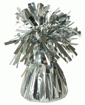 A silver balloon weight with tinsel on a white background.