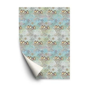 A sheet of wrapping paper with penguins on it.