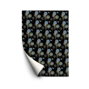 A sheet of wrapping paper with dandelions and butterflies on it.
