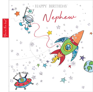 A birthday card with an astronaut and a rocket for a nephew.