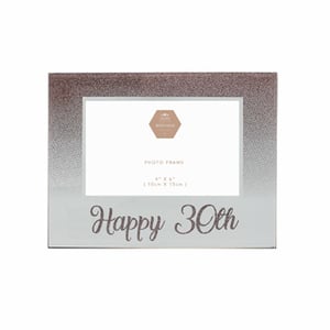 A picture frame that says "Happy 30th" on it.