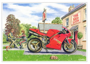 a red ducati motorcycle is parked in front of the red lion