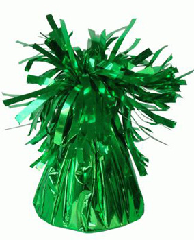 A green foil balloon weight with tinsel on a white background.