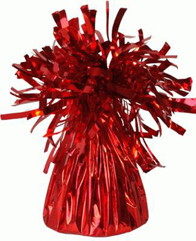 A red balloon with tinsel weighs on a white background.