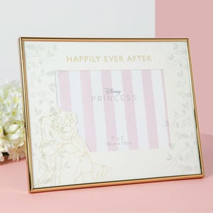 A picture frame that says "Happily Ever After" on it.