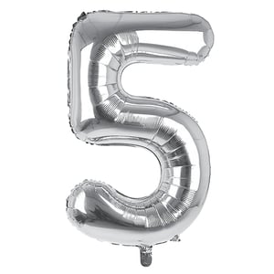 A silver balloon is in the shape of the number 5.