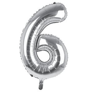 A silver balloon in the shape of number 6.