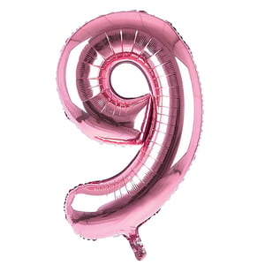 A pink balloon in the shape of number 9.