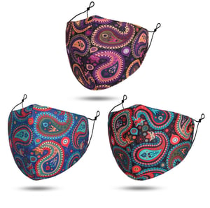 Three face masks with paisley designs on them.