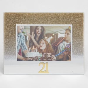 A picture frame with a picture of a group of people celebrating their 21st birthday.