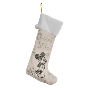 A Mickey Mouse Christmas stocking that says "Christmas Wishes."