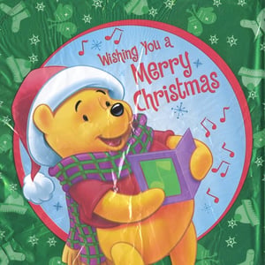 A Winnie the Pooh Christmas card wishes you a merry Christmas.