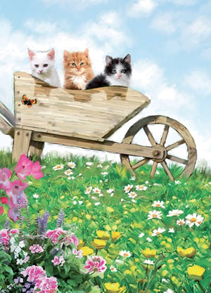 Three kittens is sitting in a wheelbarrow in a field of flowers.