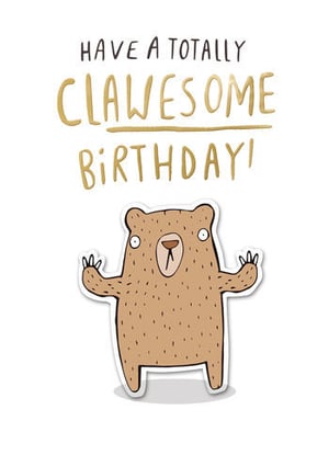 A birthday card with a bear on it says, "Have a totally clawsome birthday!"