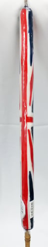 A red, white, and blue candle with a British flag design.