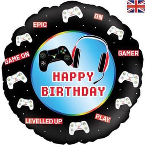 A happy birthday balloon with a game controller and headphones on it.