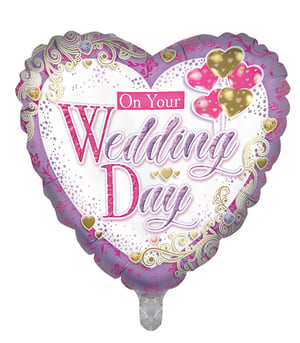 A heart-shaped balloon that says "on your wedding day."