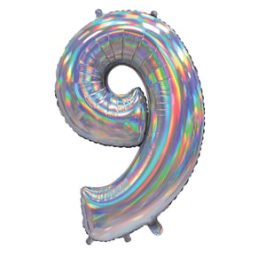 A silver balloon in the shape of the number 9.