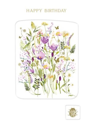 A birthday card with a bunch of flowers and a ladybug on it.