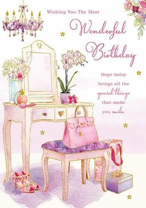 A birthday card with a vanity and a purse on it for a woman.