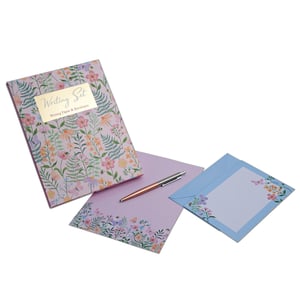 A writing set with a pen and envelopes.