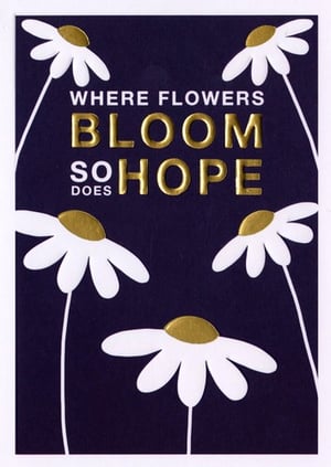 A poster that says "where flowers bloom, so does hope".