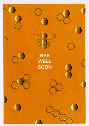 A card that says "bee well soon" on it.