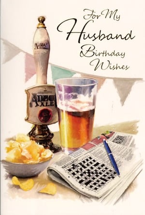 A birthday card for a husband with a glass of beer, a bowl of chips, and a crossword puzzle.