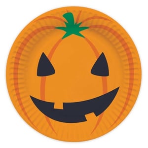 A paper plate with a pumpkin face on it.