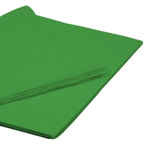 a stack of green tissue paper on a white background