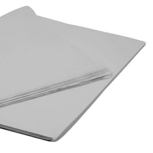two sheets of white paper are stacked on top of each other on a white background .