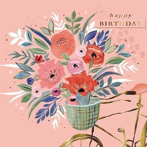 a bicycle with a basket filled with flowers on a pink background .