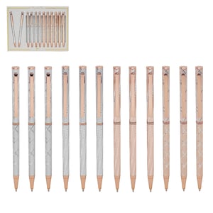 A row of silver and rose gold pens in a box.