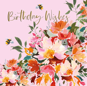 A pink background with flowers and the words "birthday wishes".
