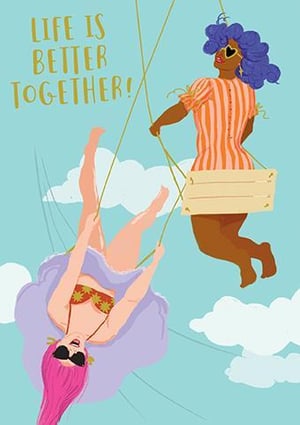 two women are swinging on a swing in the sky .