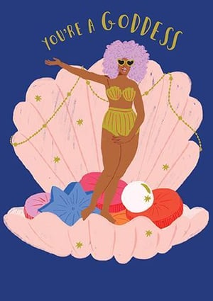 a woman in a bikini is standing in a shell .