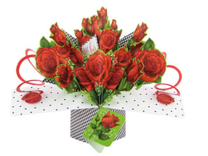 a bouquet of red roses in a box that says " i love you "