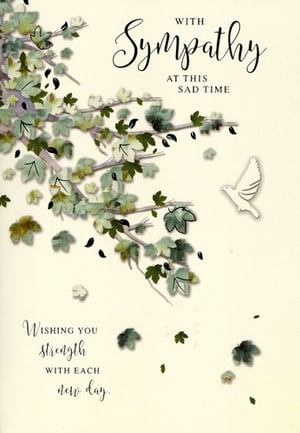 A sympathy card with flowers and a cross.
