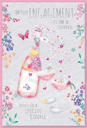 On your engagement, it's time to celebrate. Here's to a special couple.