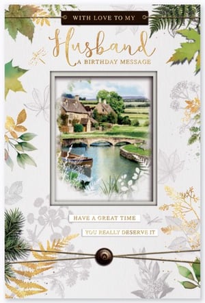 A birthday card for a husband with a picture of a bridge over a river.
