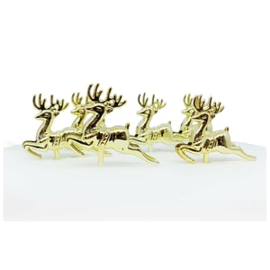 a row of gold reindeer on a white surface