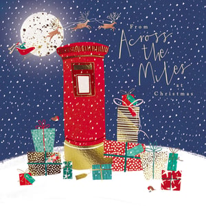 a christmas card that says from across the miles at christmas